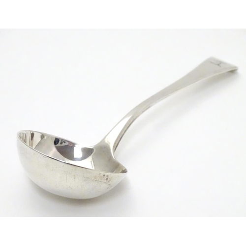 203 - A Geo III Old English pattern silver sauce ladle. Hallmarked London 1790 maker Richard Crossley. App... 