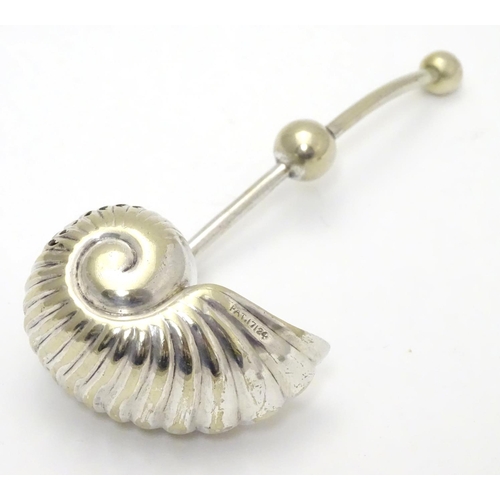 220 - An unusual silver plated sugar sifter spoon formed as a Nautilus shell, with patent stamp PAT 17124 ... 