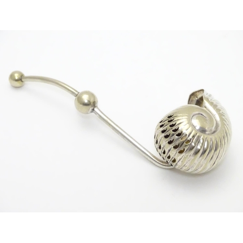 220 - An unusual silver plated sugar sifter spoon formed as a Nautilus shell, with patent stamp PAT 17124 ... 