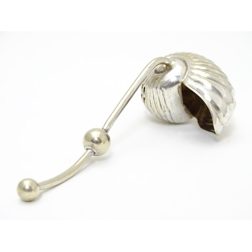 220 - An unusual silver plated sugar sifter spoon formed as a Nautilus shell, with patent stamp PAT 17124 ... 