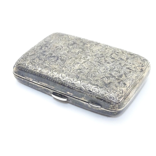 222 - A Victorian silver cigarette case with engraved floral and foliate decoration. Hallmarked Birmingham... 