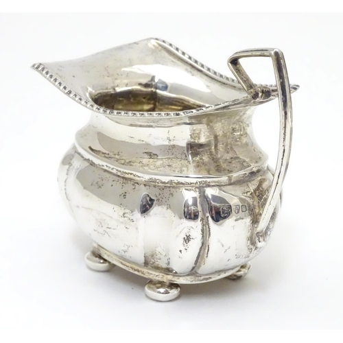 224 - A silver sugar bowl and milk jug hallmarked Chester 1904 maker George Nathan & Ridley Hayes (28g) (2... 