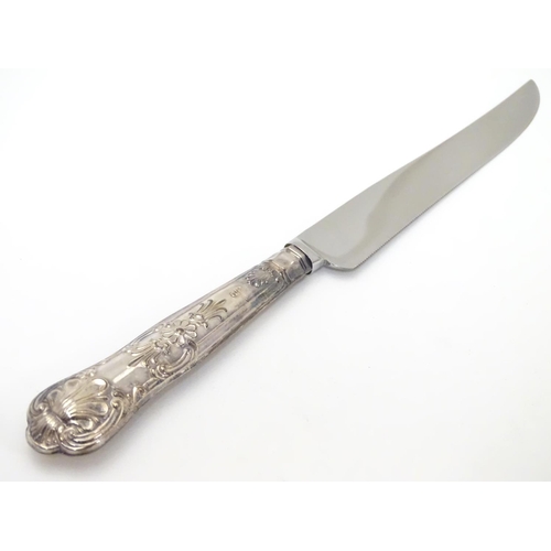 233 - A silver handled cake knife hallmarked Sheffield  1975. Harrison Brothers  10