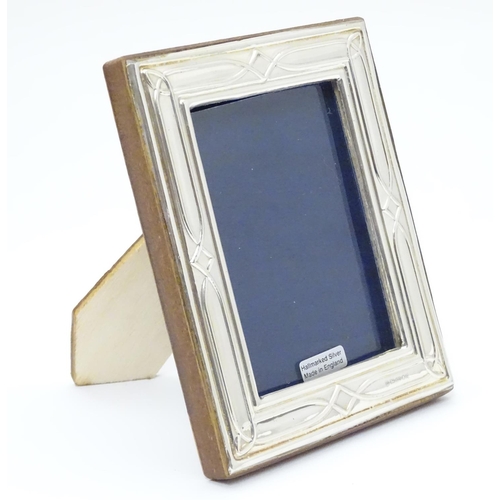 235 - An easel back photograph frame with silver surround hallmarked London 2017maker Highfield Frames. 5 ... 