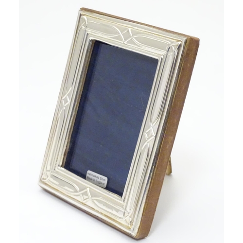 235 - An easel back photograph frame with silver surround hallmarked London 2017maker Highfield Frames. 5 ... 