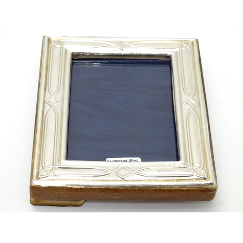 235 - An easel back photograph frame with silver surround hallmarked London 2017maker Highfield Frames. 5 ... 