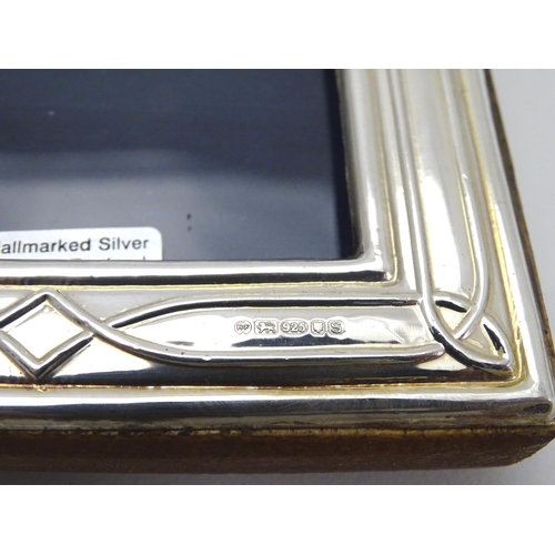 235 - An easel back photograph frame with silver surround hallmarked London 2017maker Highfield Frames. 5 ... 