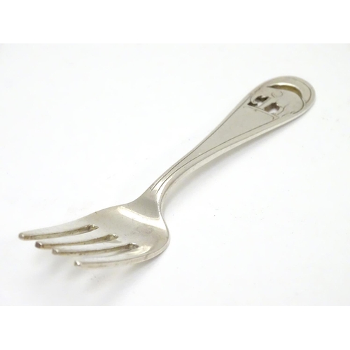 239 - An American Arts and Crafts sterling silver small fork. Having pierced and engraved design of an ele... 