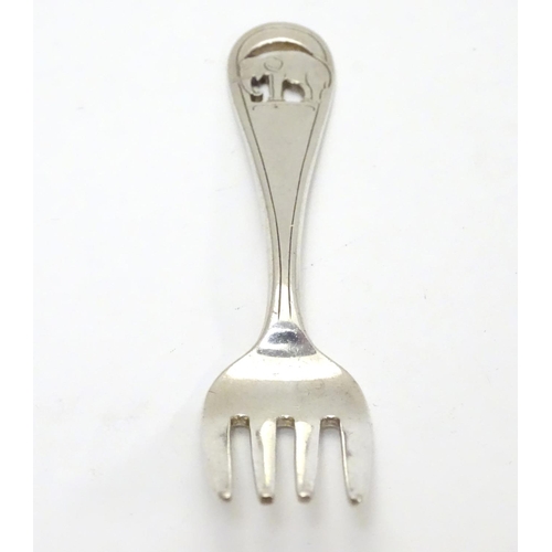 239 - An American Arts and Crafts sterling silver small fork. Having pierced and engraved design of an ele... 