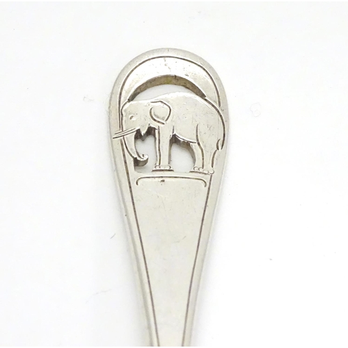 239 - An American Arts and Crafts sterling silver small fork. Having pierced and engraved design of an ele... 