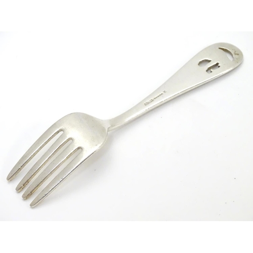 239 - An American Arts and Crafts sterling silver small fork. Having pierced and engraved design of an ele... 