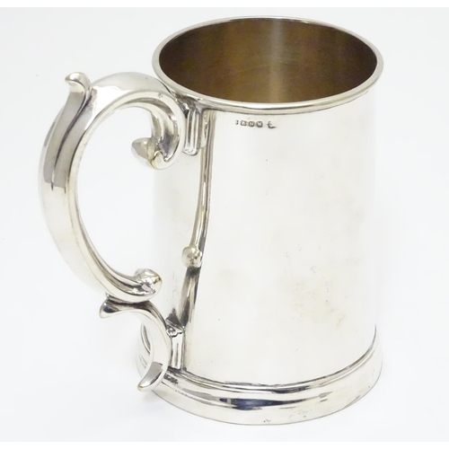 240 - A mid 19thC silver plated 1 pint tankard by Harrison of Sheffield. 5 1/2