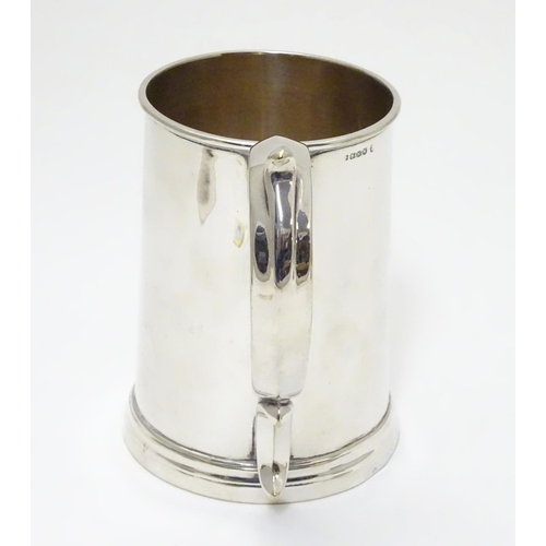 240 - A mid 19thC silver plated 1 pint tankard by Harrison of Sheffield. 5 1/2