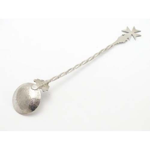 243 - A Maltese silver shallow ladle/ice cream spoon, the twisted handle terminated with a Maltese cross, ... 