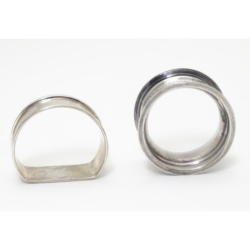 255 - Two silver napkin rings, one D-shaped with engine-turned decoration, hallmarked Birmingham 1965 make... 