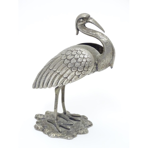 256 - A white metal model of a stork / crane. indistinctly marked under. Approx. 4 1/2