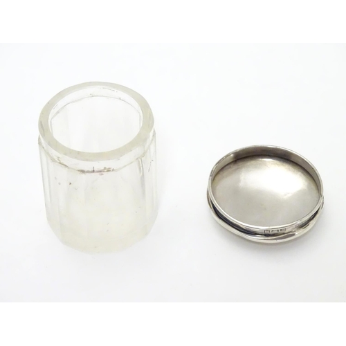 257 - A glass dressing table pot with silver top hallmarked Birmingham 1905 maker  M bros. 2