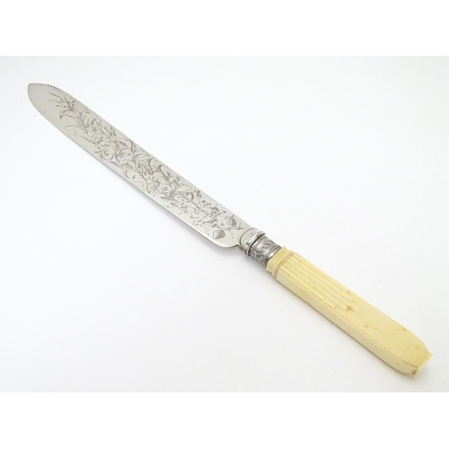 259 - A cake knife with silver plate blade 13 1/2