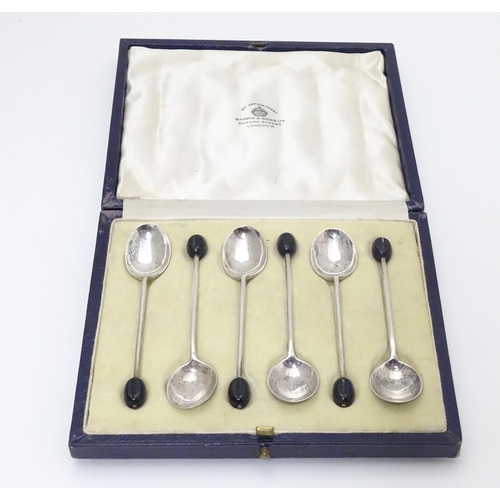 262 - A cased set of 6 silver coffee spoons with coffee bean decoration to handles. Hallmarked Birmingham ... 