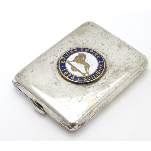 265 - A silver plate match book case with enamel roundel to top ' British Empire Exhibition 1924'  2 1/4