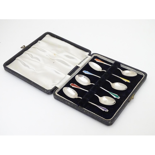 268 - A cased set of 6 Art deco silver teaspoons with coloured guilloche enamel decoration to handles. Hal... 