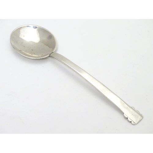 269 - An Art Deco silver jam / preserve spoon. Hallmarked Chester 1947 maker JH. 5 1/4