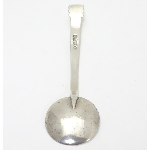 269 - An Art Deco silver jam / preserve spoon. Hallmarked Chester 1947 maker JH. 5 1/4