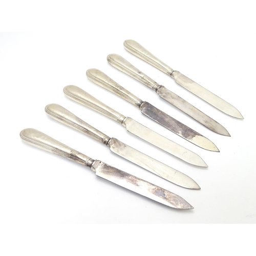 274 - A set of 6 silver handled tea knives. Hallmarked Sheffield 1918. Approx. 7 1/2