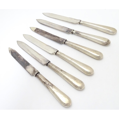 274 - A set of 6 silver handled tea knives. Hallmarked Sheffield 1918. Approx. 7 1/2