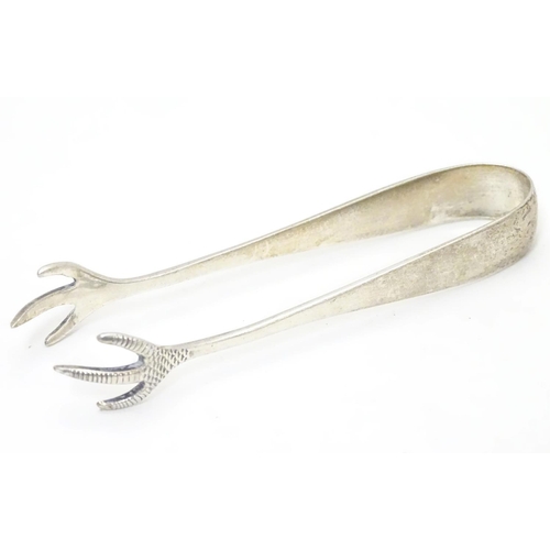 276 - Silver sugar tongs with bird’s claw formed grips.  Hallmarked Birmingham 1938 maker Barker Bros Silv... 