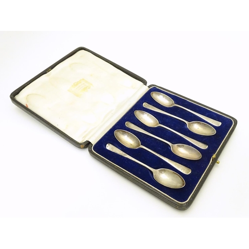 282 - A cased set of 6 silver teaspoons Hallmarked 1924 maker Harrods Ltd. Approx 4 1/4