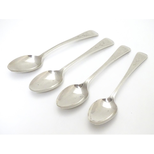 283 - A set of 4 Victorian silver Old English pattern teaspoons with bright cut engraved decoration . hall... 