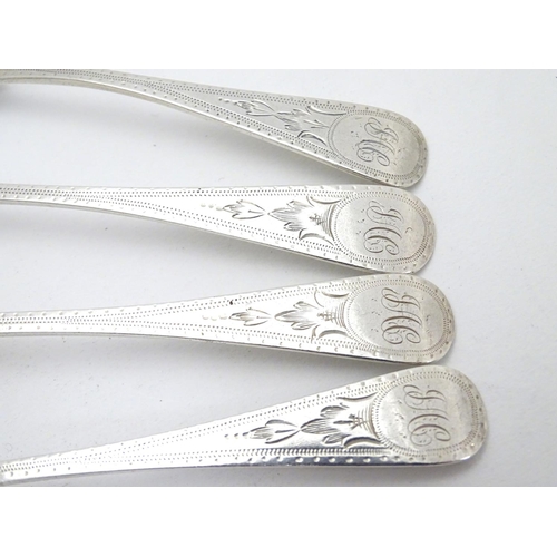 283 - A set of 4 Victorian silver Old English pattern teaspoons with bright cut engraved decoration . hall... 