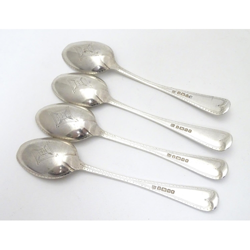 283 - A set of 4 Victorian silver Old English pattern teaspoons with bright cut engraved decoration . hall... 