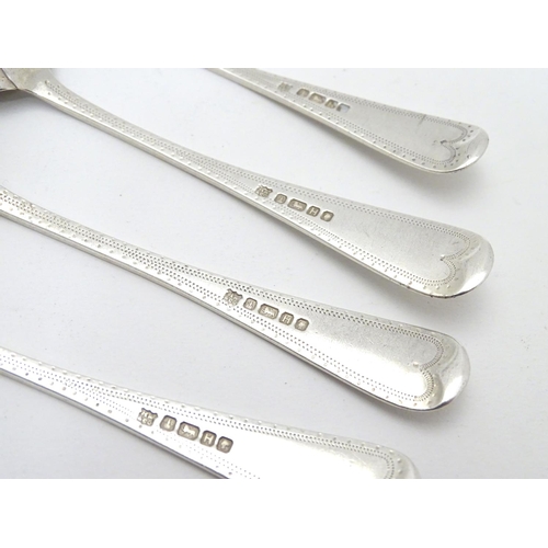 283 - A set of 4 Victorian silver Old English pattern teaspoons with bright cut engraved decoration . hall... 