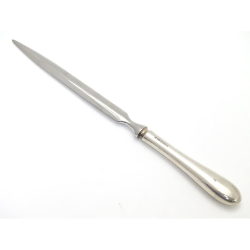 285 - A silver handled letter opener / paper knife. hallmarked Sheffield 2007 maker Carr's of Sheffield Lt... 