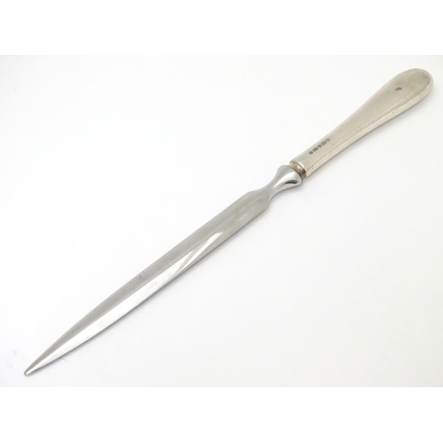 285 - A silver handled letter opener / paper knife. hallmarked Sheffield 2007 maker Carr's of Sheffield Lt... 