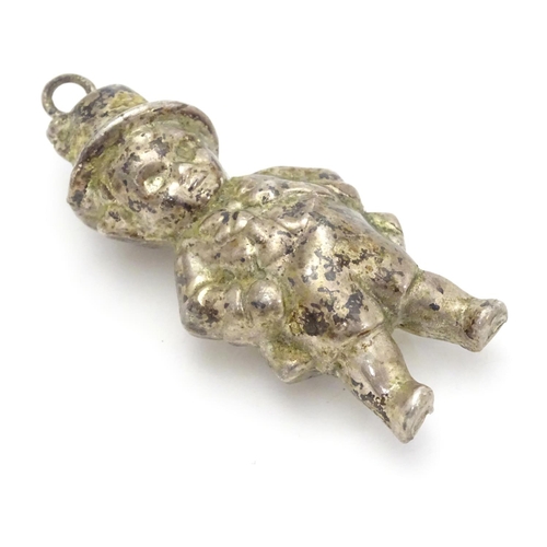 336 - A novelty silver plate rattle formed as a young child 2 1/4