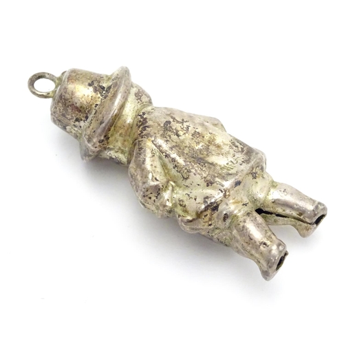 336 - A novelty silver plate rattle formed as a young child 2 1/4