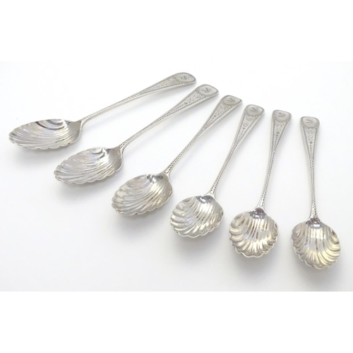 347 - 6 Geo III silver teaspoons with bright cut decoration and shell formed bowls . Hallmarked London 179... 