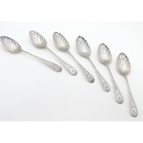 347 - 6 Geo III silver teaspoons with bright cut decoration and shell formed bowls . Hallmarked London 179... 