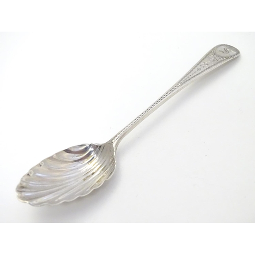 347 - 6 Geo III silver teaspoons with bright cut decoration and shell formed bowls . Hallmarked London 179... 