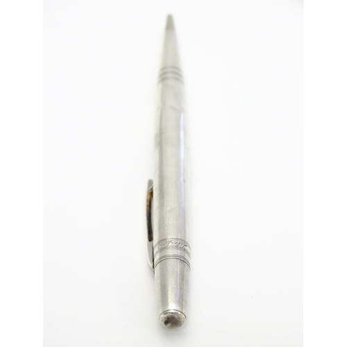 349 - A Sterling silver ' Life Long' propelling pencil with engine turned decoration Approx 4 3/4