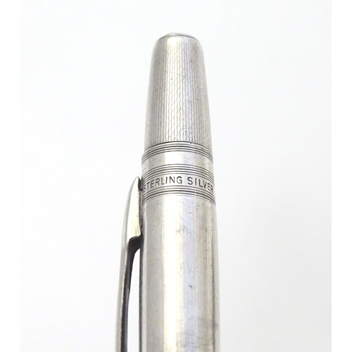 349 - A Sterling silver ' Life Long' propelling pencil with engine turned decoration Approx 4 3/4