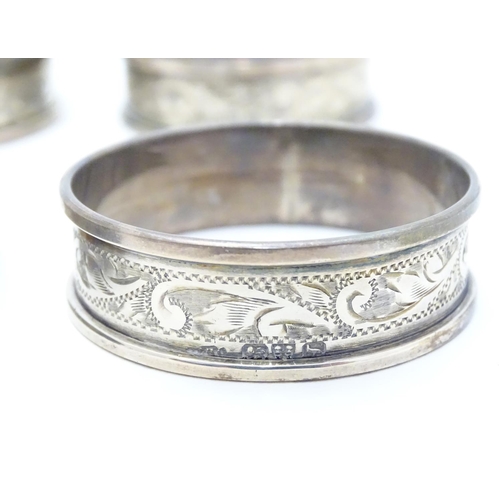 351 - Six silver napkin rings with engraved acanthus scroll decoration. Hallmarked 1919 (6)