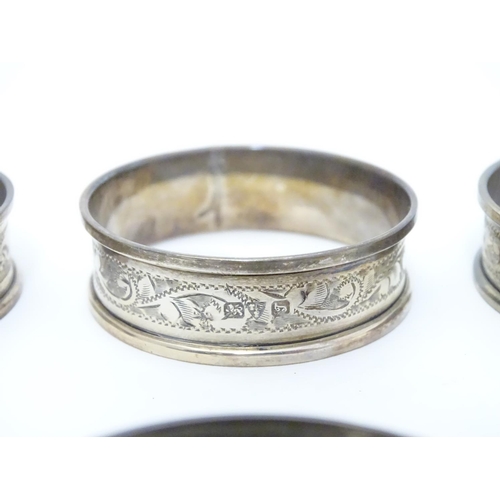 351 - Six silver napkin rings with engraved acanthus scroll decoration. Hallmarked 1919 (6)