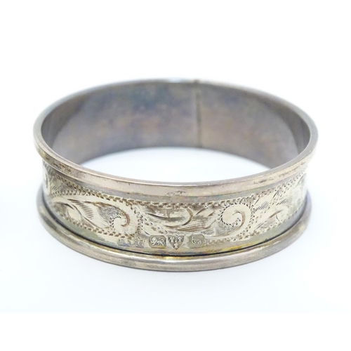 351 - Six silver napkin rings with engraved acanthus scroll decoration. Hallmarked 1919 (6)