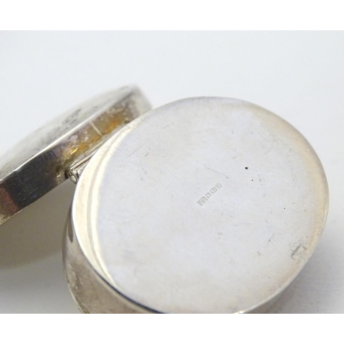 358 - A silver pill box of oval form Hallmarked Sheffield 1998 together with a .925 silver pill box with m... 