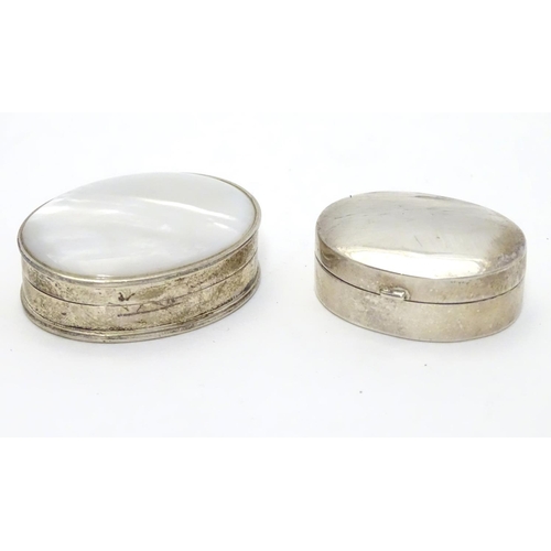 358 - A silver pill box of oval form Hallmarked Sheffield 1998 together with a .925 silver pill box with m... 