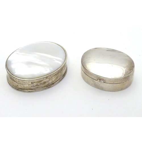 358 - A silver pill box of oval form Hallmarked Sheffield 1998 together with a .925 silver pill box with m... 